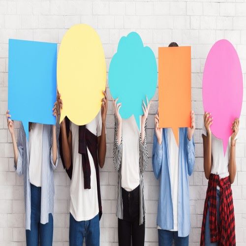People holding caption shapes