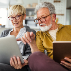 People looking at a computer