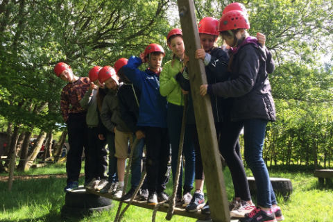 group of people wearing protective helmets