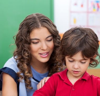 Childcarer with pupil