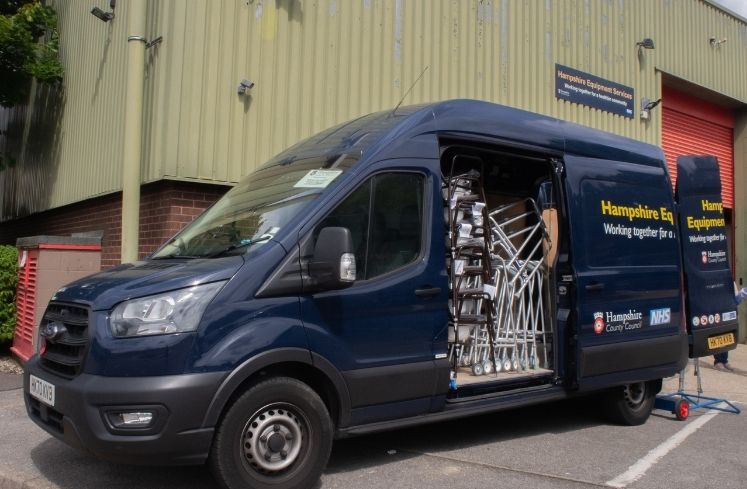 A Hampshire Equipment Services van outside a warehouse