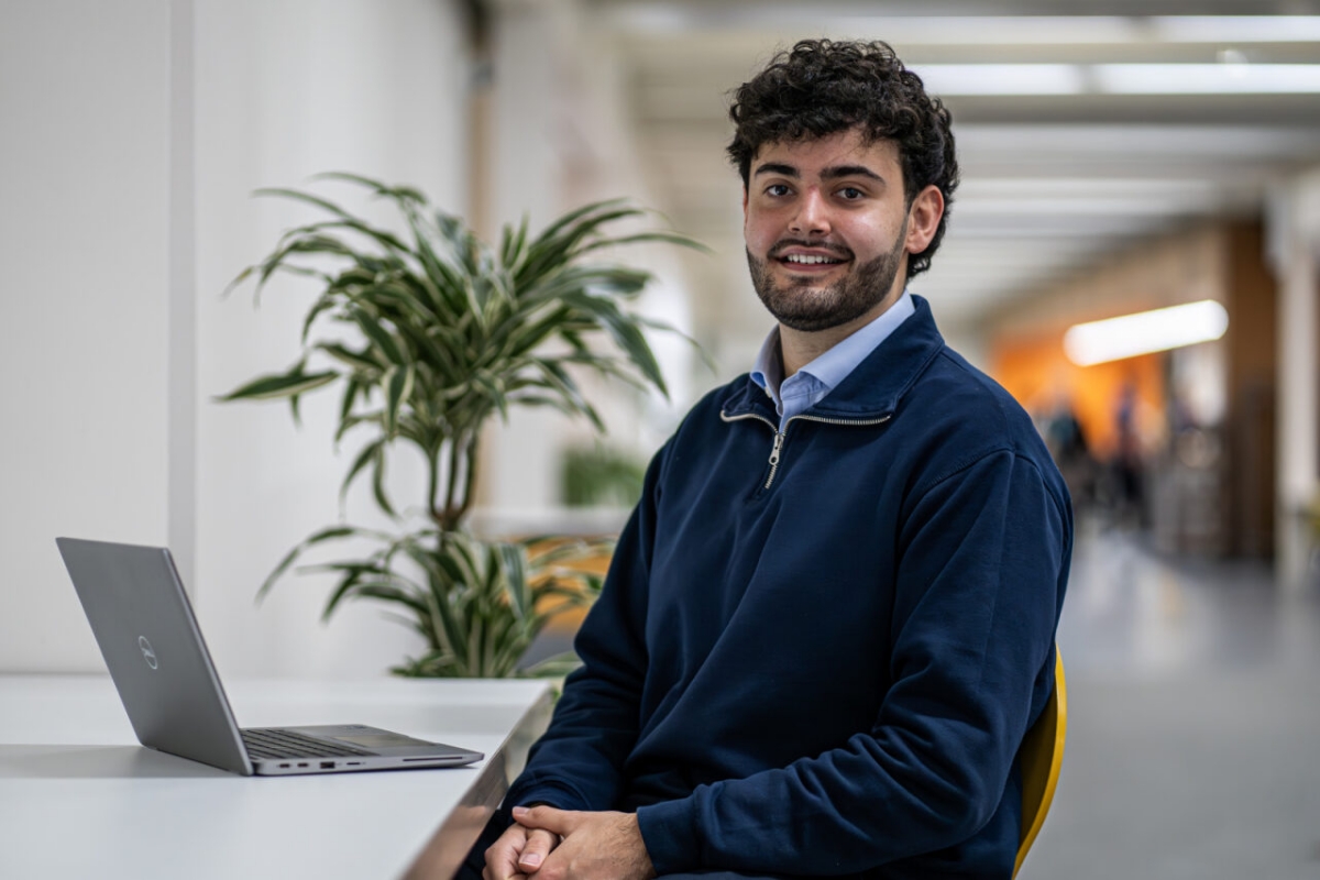 Male staff member working at desk