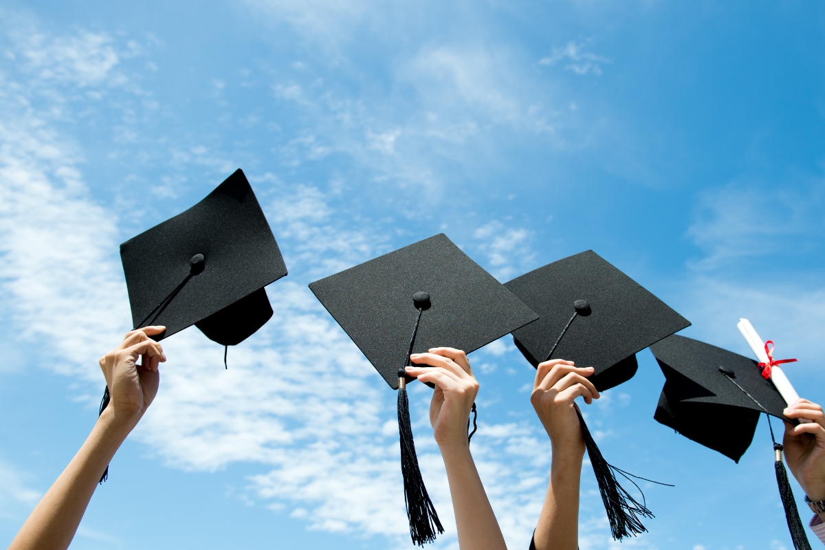 Graduation hats in the air