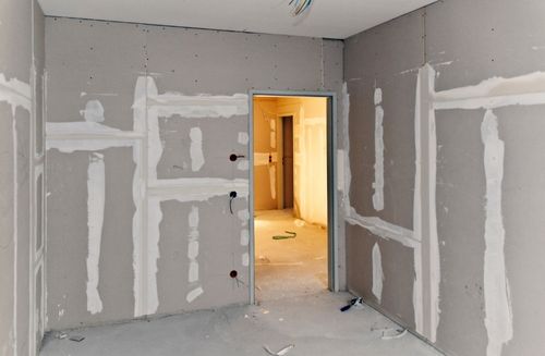 A wall with plastering marks