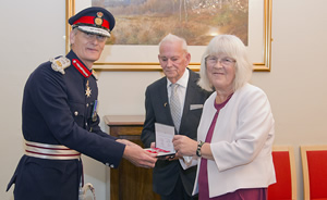 Hampshire Carers presented with MBE medals two years after Honours