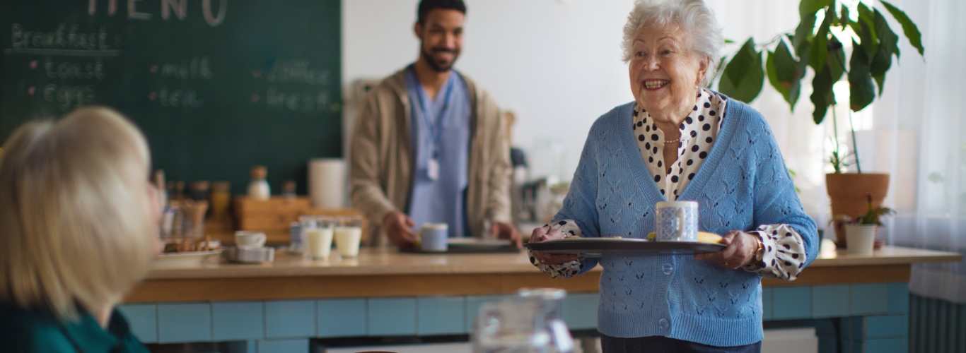 lady in coffee shop carrying a tray