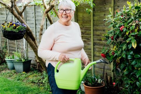 Woman watering the garden