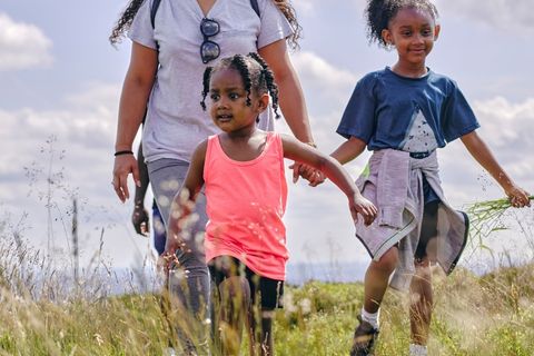 children in the countryside running
