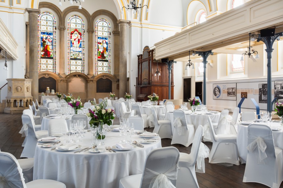 The Chapel with round tables for a wedding reception