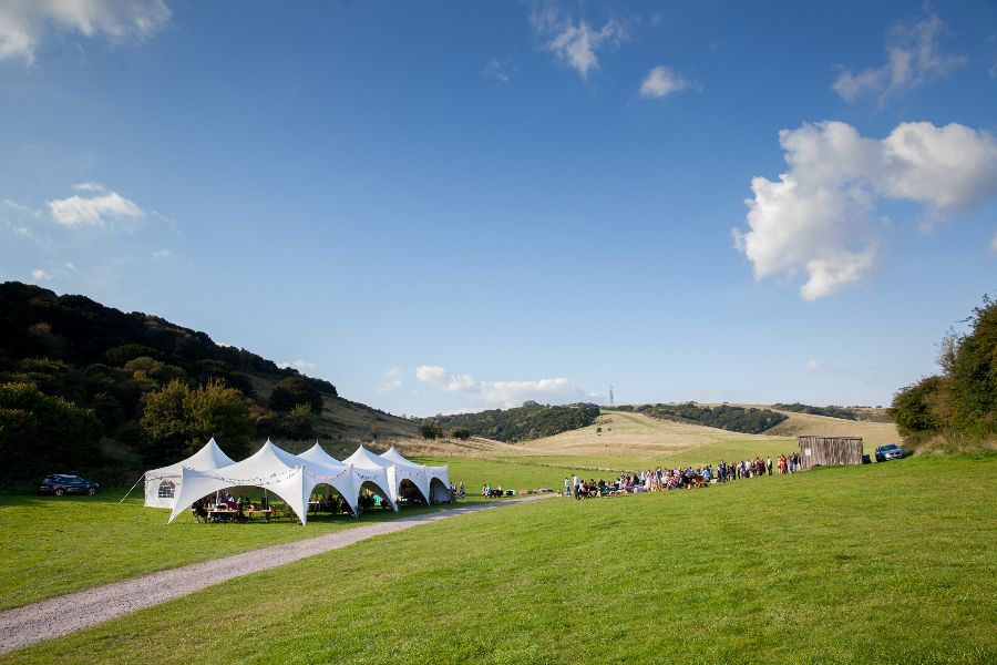 wedding festivities taking place in the field