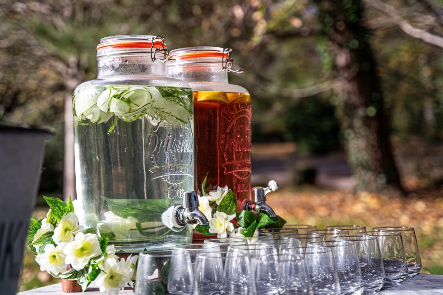 Drinks table with two jugs and several glasses
