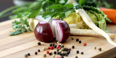 vegetables and spice on wooden board
