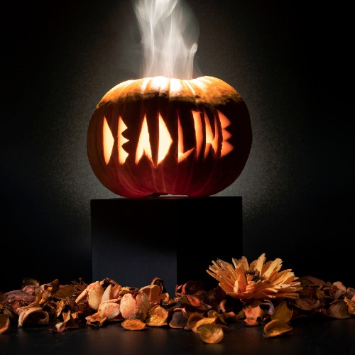halloween pumpkin with the word "deadline" caraved into it