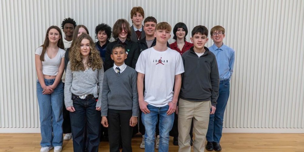 Group shot of new Members of Youth Parliament stood outside Hampshire County Council