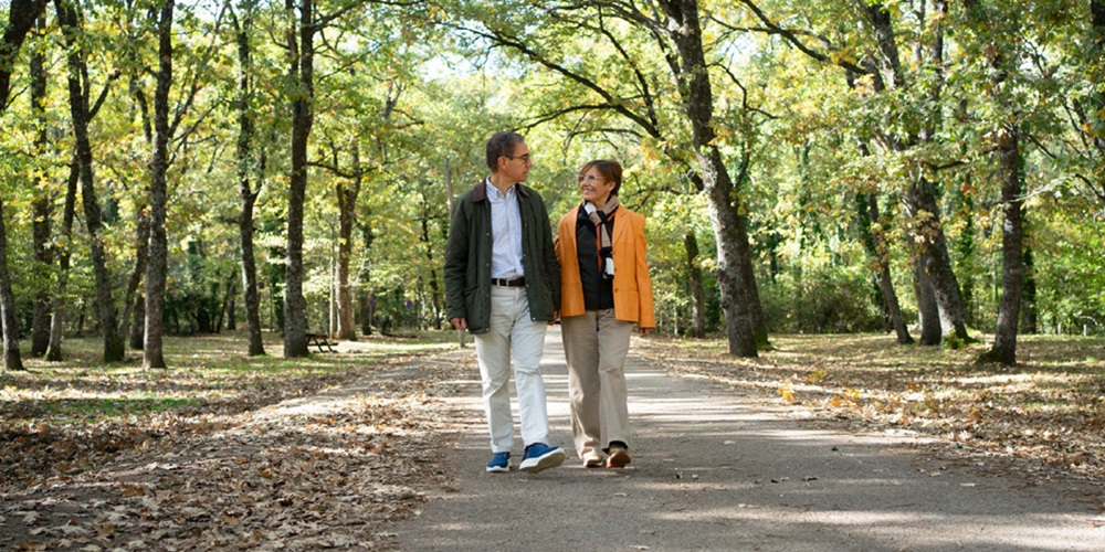 Man and woman on a woodland walk