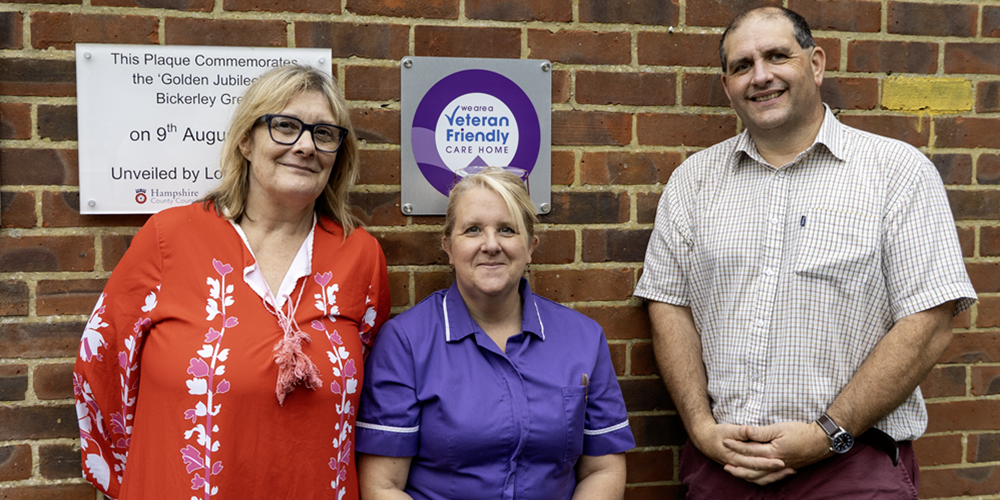 Bickerley Green care home staff and the Veteran Friendly plaque