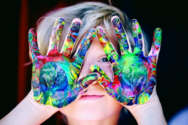 Child with painted hands