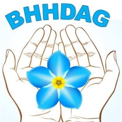 Hands holding a blue flower