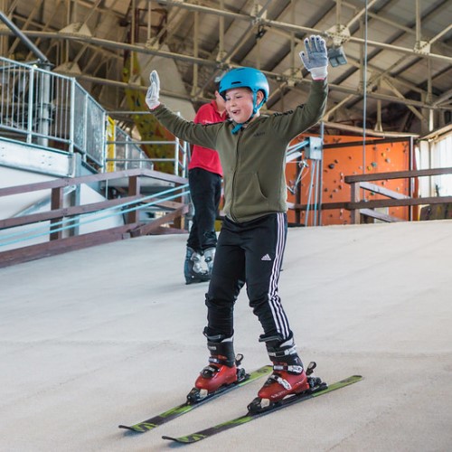 Boy learning to ski