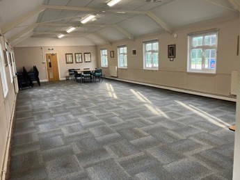 Large, flexible meeting space with table and chairs