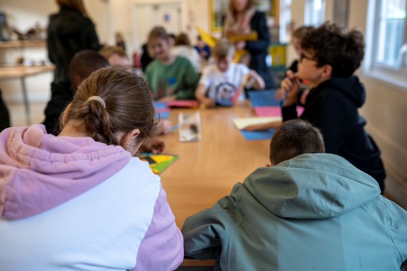 Children focusing on a task in a classroom
