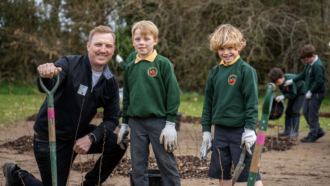 School children planting trees