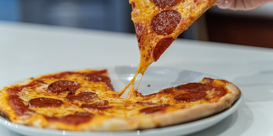 A pizza about to be eaten