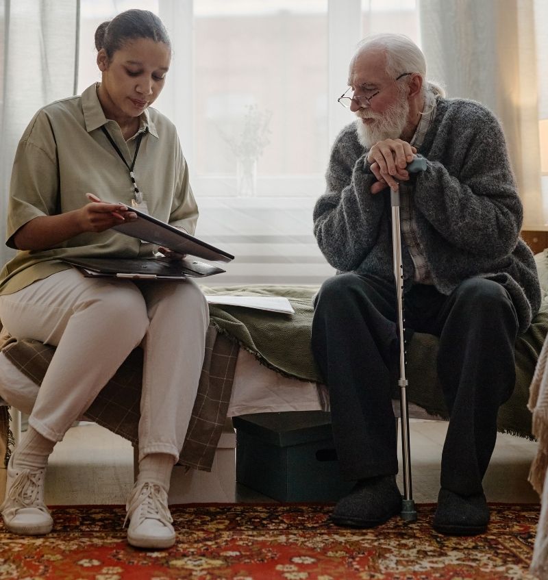 Reablement staff member working with an older person