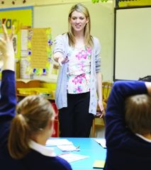 teacher instructing a classroom