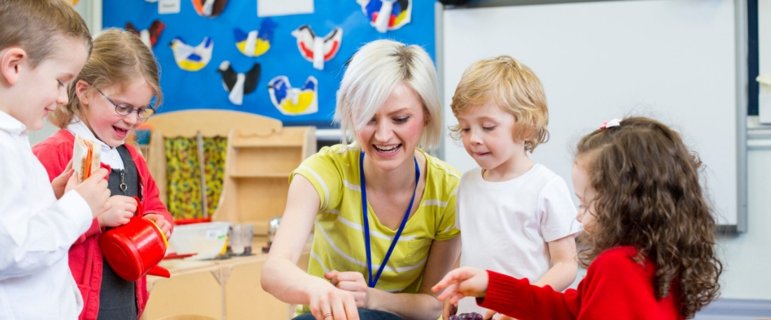 out of school club staff working with children