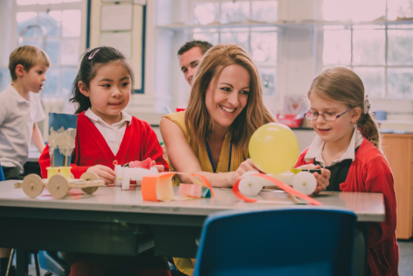 Teaching assistant in classroom