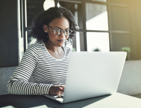Happy employee with laptop