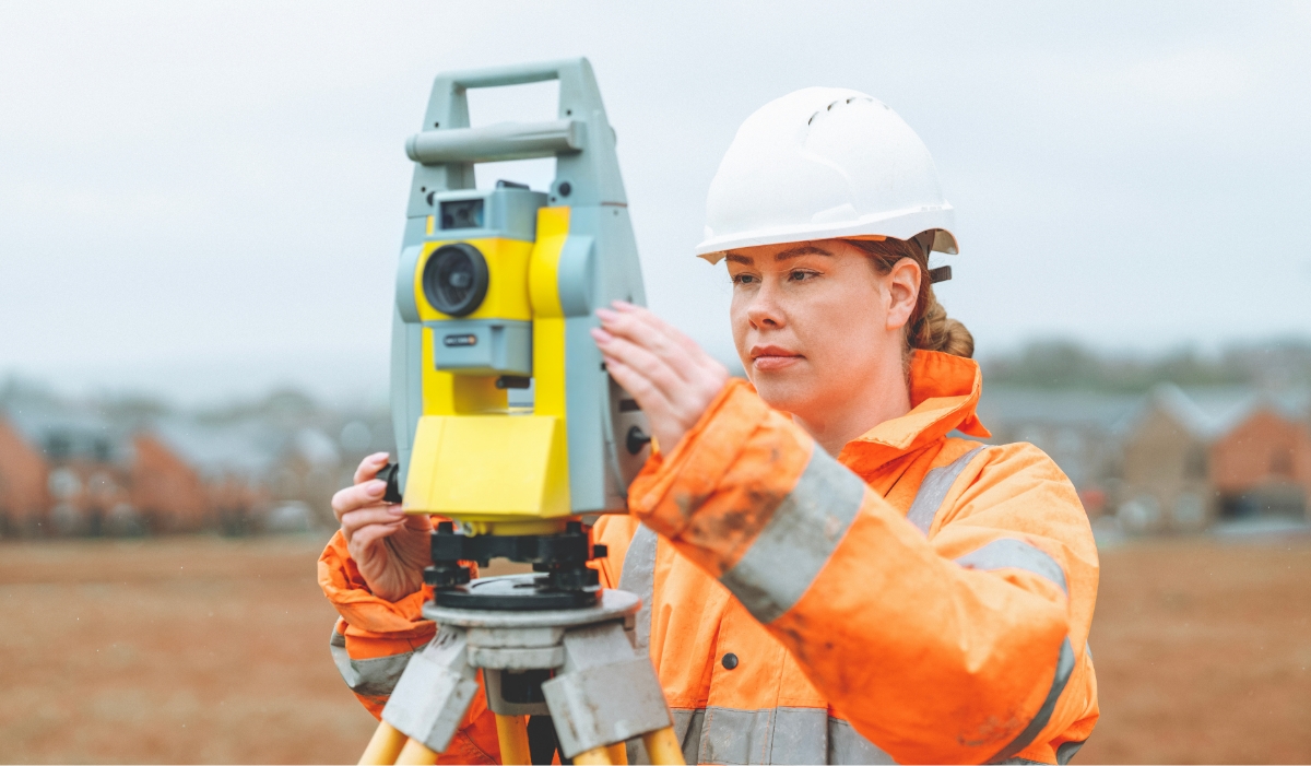 Female worker with highways equipment