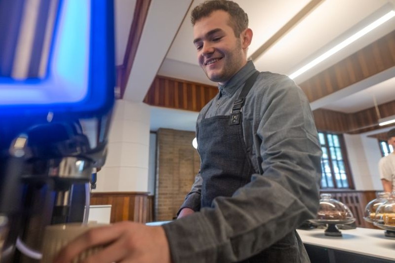 coffee shop working preparing drinks