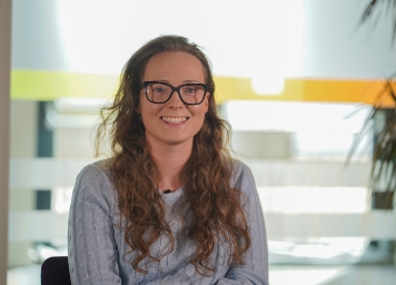 Happy employee with laptop