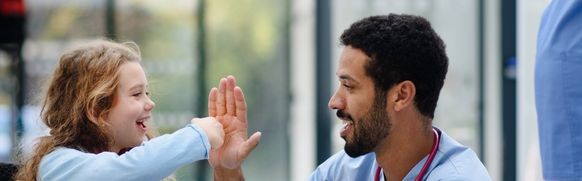child and Dr interacting