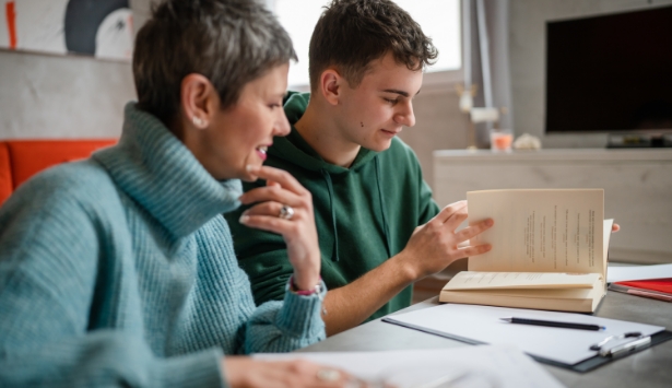 Women working with teenager