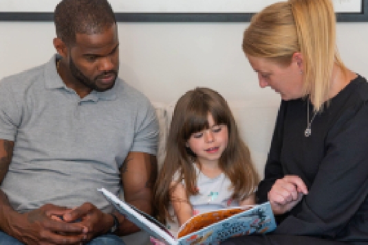 Boy with adopting parent